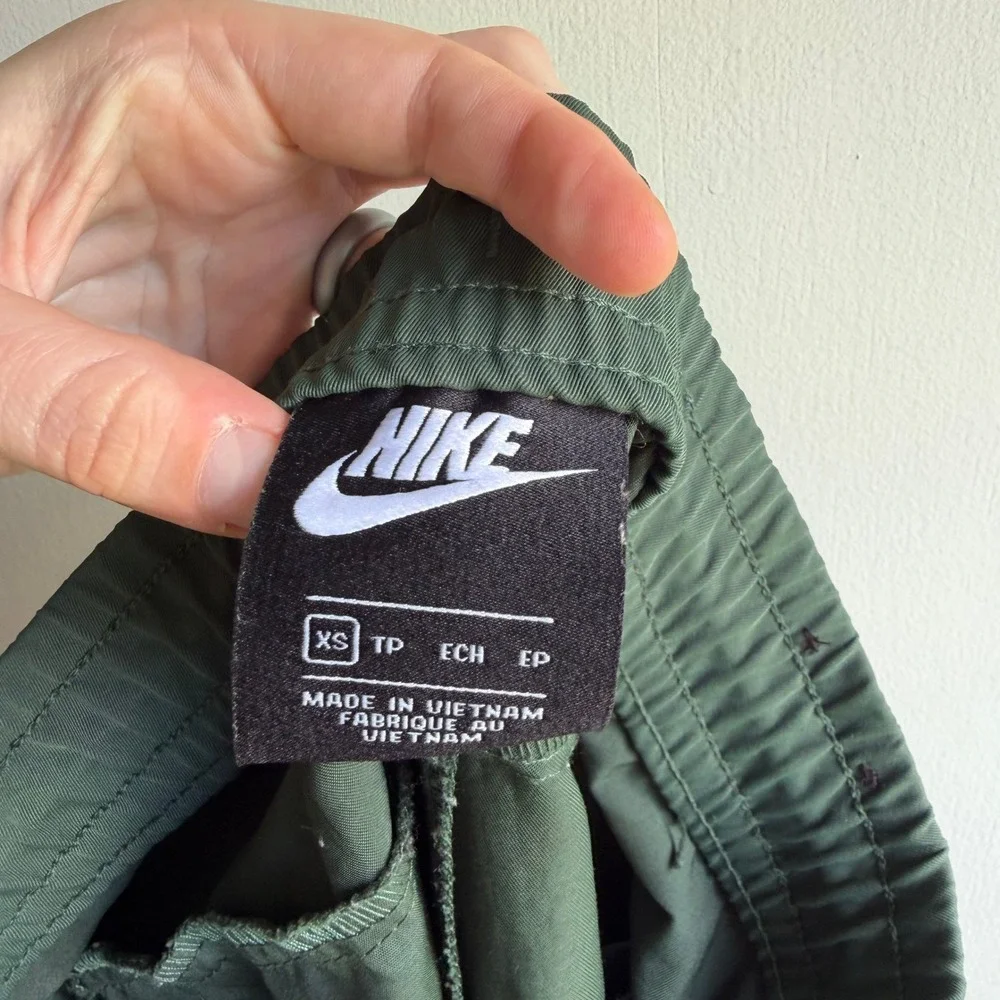 Nike Womens Tech Essentials Woven Tapered Pants Dark Green Olive XS